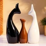 Amazon Basics Home Decoration Happy Deer Family Set | Piano Finish Ceramic Figures (Set of 3, Black, White & Brown)